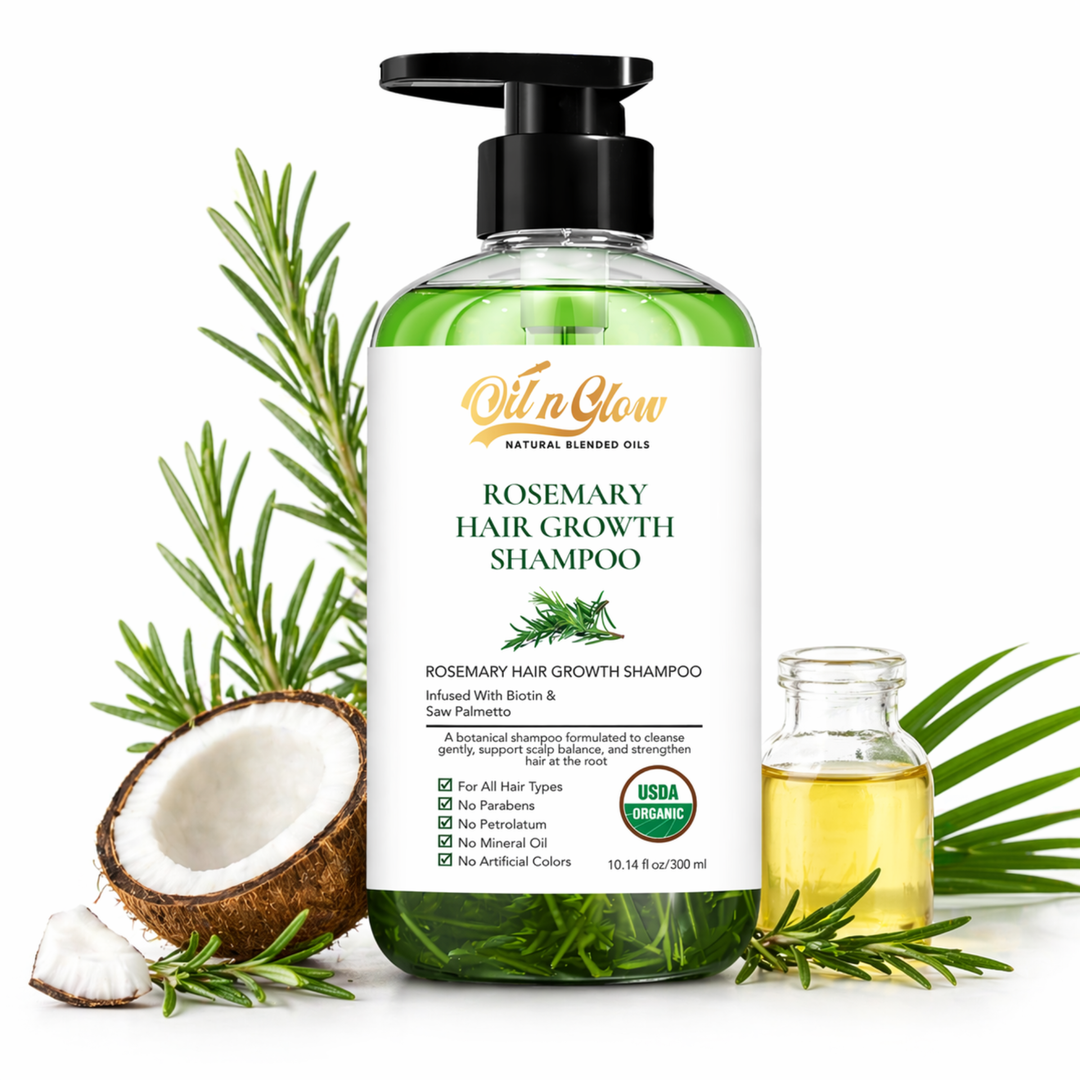 Rosemary hair growth shampoo bottle with coconut, rosemary leaves, and oil on a white background by oilnglow